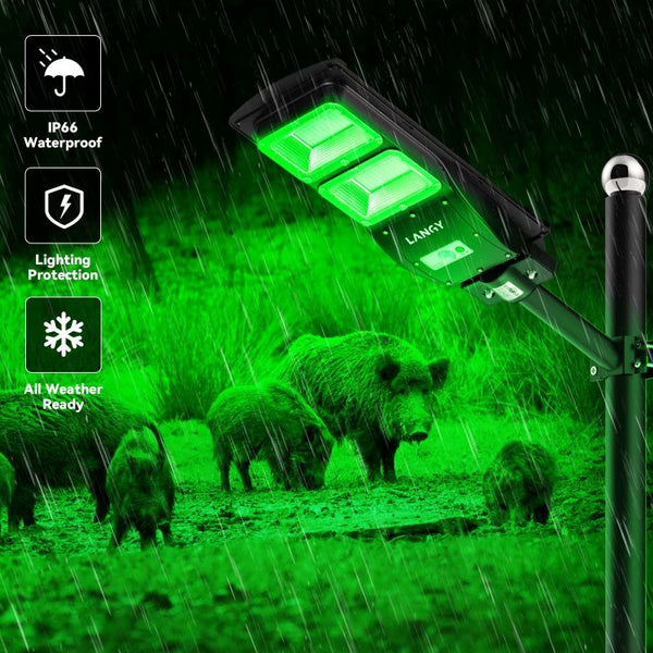 Load image into Gallery viewer, Solar feeder light emitting green light in a rain scene with hogs, highlighting waterproof and all-weather features.